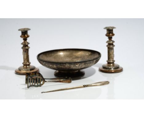 A silver circular bowl, with a decorated rim, raised on a plain circular foot, diameter 29cm, Sheffield 1933, weight 1105 gms