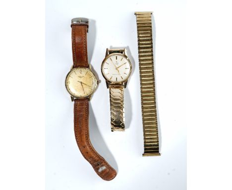 A Tudor Royal 9ct gold circular cased gentleman's wristwatch, the signed silvered dial with gilt baton numerals and with cent