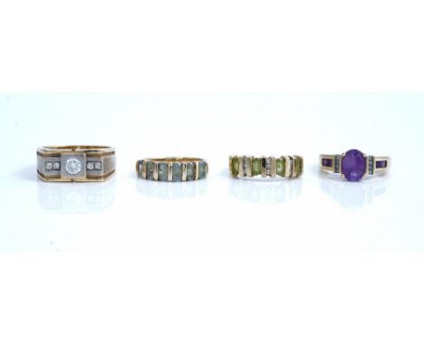 A gold and colourless gem set ring, detailed Balkan 585, a gold, amethyst and diamond set ring, detailed 14 K and two further