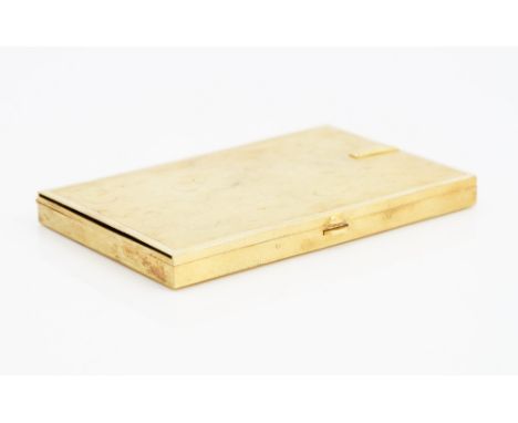 A gold rectangular visiting cards case, having a textured finish, two sprung clip fittings within, detailed Manning 18 K, the