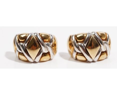 A pair of 9ct bi-gold earclips of abstract half-hoop design, weight 12.7gms