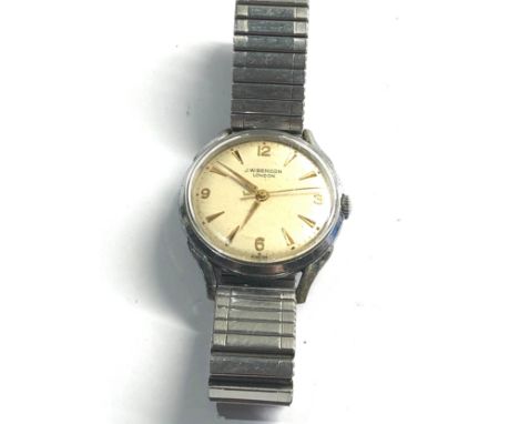 Vintage gents J.W Benson wristwatch  watch is ticking but no warranty given 