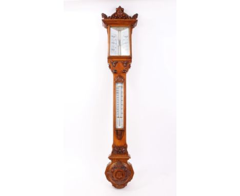 Victorian stick thermometer / barometer with white painted scales, in ormolu carved Gothic-style oak case, 109cm high CONDITI