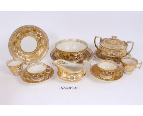 Early 19th century English, possibly Coalport London-shape teaware with gilt flowers on white and cream ground, with 2/181 pa