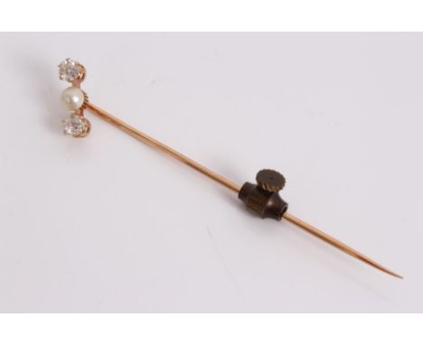 Late Victorian diamond and cultured pearl stick pin, the diagonal line with a button pearl flanked by two old cut diamonds, i