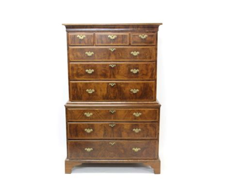 Good George II walnut crossbanded and feather-strung chest on chest with concave cornice and three short over six long gradua