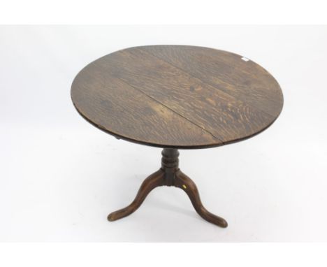 George III oak wine table with circular top on turned column and tripod base, 92cm