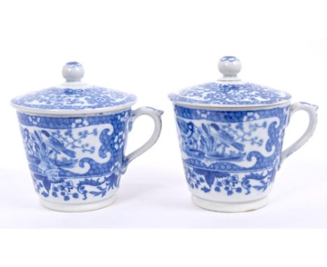 Two early 19th century, probably Spode pearlware blue and white custard cups and covers with printed bird and floral decorati