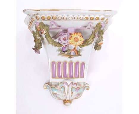 Late 19th century German porcelain wall bracket with painted figures and floral swag decoration, 18cm high x 18cm wide
