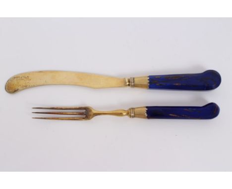 Pair 18th century Aventurine glass-handled and gilded knife and fork with pistol-shaped grips, three-pronged fork and swollen