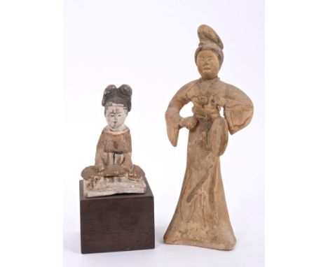 Ancient Chinese, possibly Tang Dynasty pottery tomb figure of a seated female musician with string instrument on her lap and 