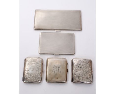 1930s silver cigarette case of rectangular form, with engine-turned decoration, together with four other silver cigarette cas