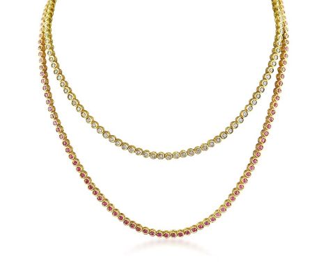 Diamond and ruby festoon necklace designed as two rows of collet set circular cut rubies and diamonds, mounted in yellow gold
