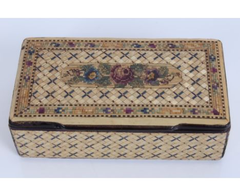 19th century straw-work snuff box of oblong form, the concealed hinged cover centred by polychrome stained floral reserve in 