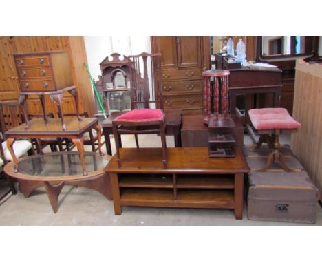 An oval teak coffee table with inset glass panel, possibly G-plan together with a walnut coffee table, a walnut bedside cabin