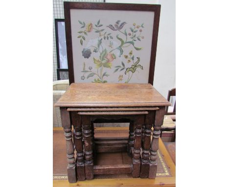 An oak nest of three tables together with a walnut chest of drawers and a fire screen