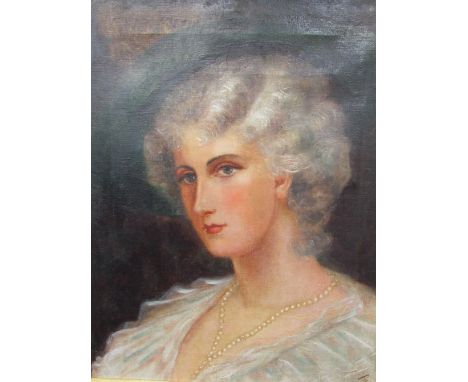 20th century British SchoolHead and shoulders portrait of a ladyOil on canvasInitialled JE38 x 30cm