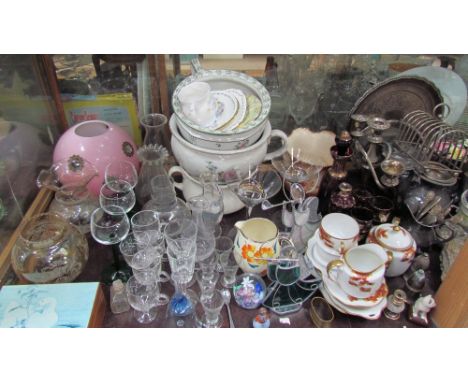 A large lot including drinking glasses, chamber pots and pink glass lamp shade, together with a Japanese part tea set, amber 