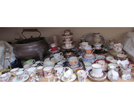 A large collection of cabinet cups and saucers including Worcester, Spode, Dresden, Cauldon, etc, together with a copper caul