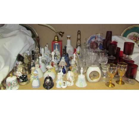 Assorted bells together with ruby glasses, etc
