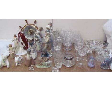 Assorted Lladro and Nao figures together with a Royal Worcester figure of the Queen, Dartington crystal, glasses etc