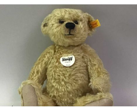 STEIFF, JONA BEAR modern blond plush, with button eyes and moveable joints29cm long