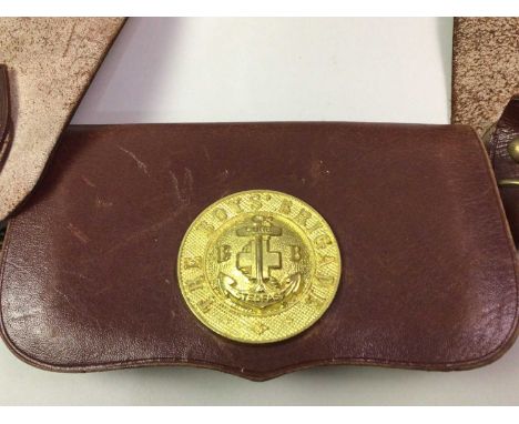 BOYS BRIGADE CLOCK IN THE FORM OF A STIRRUP, THREE BOYS BRIGADE LEATHER BELTS the clock by Smiths and three Boys Brigade badg