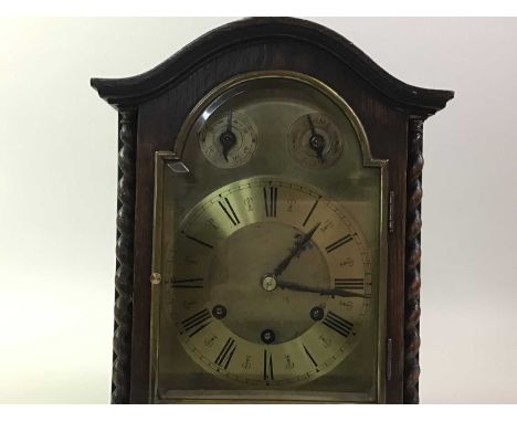 GUSTAV BECKER, EARLY 20TH CENTURY OAK BRACKET CLOCK the gilt and brass dial with numerals in black above a presentation plaqu