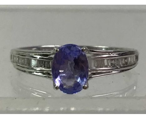 TANZANITE AND DIAMOND DRESS RING, in nine carat white gold