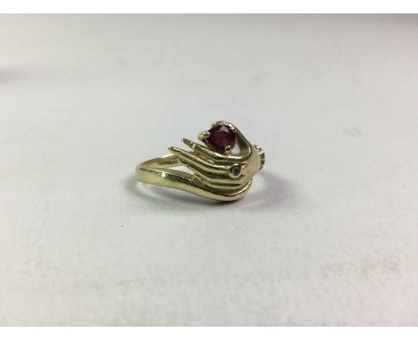 GOLD DRESS RING, set with a pear shaped ruby and a small diamond chip, marked 585