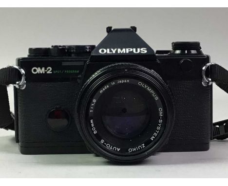 OLYMPUS OM-2 CAMERA, ALONG WITH OTHER ITEMS  including cameras, lens, typewriter and a projector