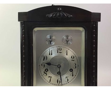 GEORGE V BRACKET CLOCK, CASED IN MAHOGANY the silvered dial with numbers in black35cm high