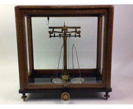 SET OF MICROID BALANCE SCALES, MID-20TH CENTURY in glazed mahogany case43cm high overall