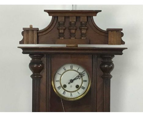 GUSTAV BECKER, 19TH CENTURY WALL CLOCK the brass and white enamel dial with numerals in black75cm high 