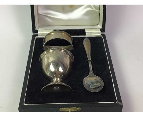 SILVER CHRISTENING SET, LATE 20TH CENTURY  comprising egg cup, napkin ring and spoon, in fitted box 