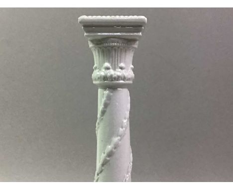 ROYAL WORCESTER, WHITE GLAZED PORCELAIN CANDLESTICK, LATE 19TH CENTURY after a Corinthian design, green mark to base28cm high