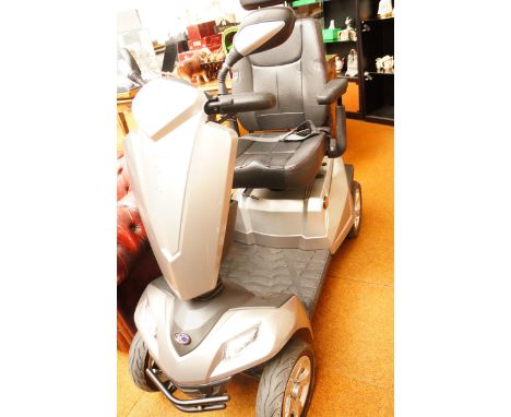 Kymco maxer mobility Scooter in excellent condition with charger and two spare Wheels