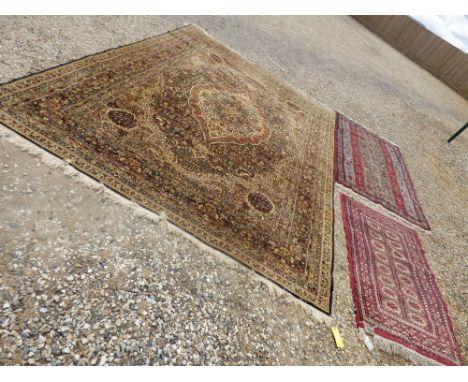 Unusual Persian style rug with stylized decoration, a Bokhara style rug & a large Persian design machine made carpet