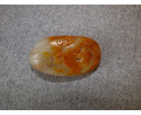 Chinese jade pebble carved with a sea serpent / dragon 6cm L 