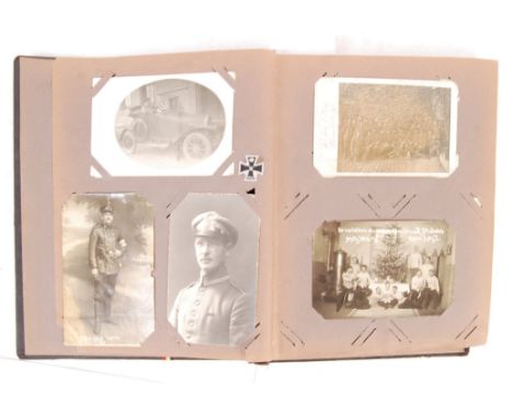 A rare WWI First World War Imperial German real photographic postcard album. The album itself being a German made ' 1914 ' Ir