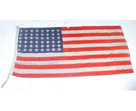 A rare WWII Second World War United States US Army flag. Flag of usual form with stars and stripes. Measures; 84cm x 181cm