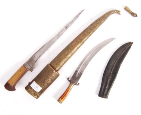 Two early 20th Century antique Indian daggers to include; Pesh-Kabz ( peshkabz ) dagger having a horn handle with T shaped bl