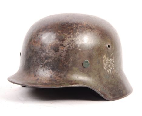 An original WWII Second World War German Army Nazi Third Reich Stahlhelm M35 infantry all steel uniform helmet. Double decal 
