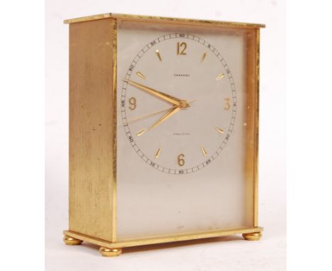 A 1970's retro vintage Garrard Precision mantle clock presented to K H Varty from the Directors Of Esso Petroleum Co. Ltd for