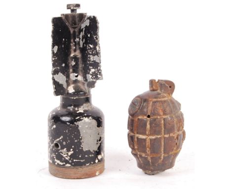 Two WWII Second World War inert ordnance / bomb shells. The first being a WWII Mortar bomb part-shell round - with four fins,