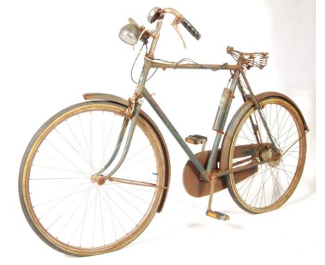 An original vintage believed 1930's ex Police / Policeman's bicycle. Unrestored example, with original period fittings includ