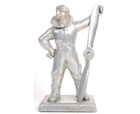 An incredible rare WWII Second World War mid-century aluminium presentation tabletop cigarette lighter. The lighter in the fo