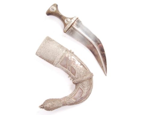 A 20th Century Middle Eastern Saudi Arabia / Jazan Jambiya Khanjar dagger&nbsp;having a shaped horn handle adorned with coins