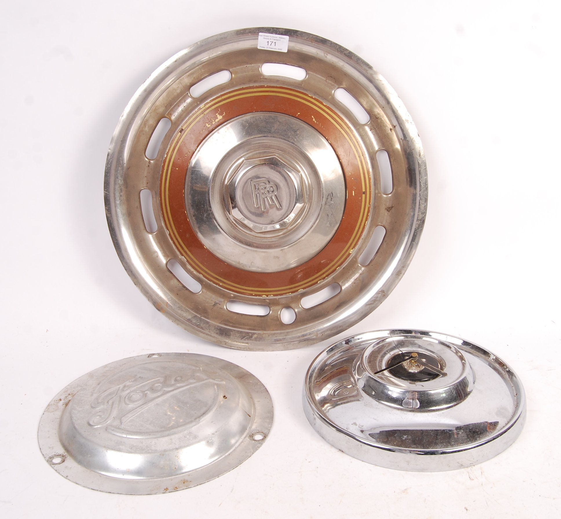 A collection of classic car autombolia hub caps to include; Rolls Royce