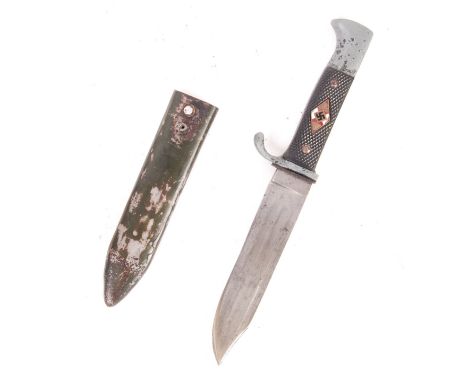 A unusual WWII Second World War German Nazi Third Reich HJ Hitler Youth dagger having black chequered grips with the Hitler Y